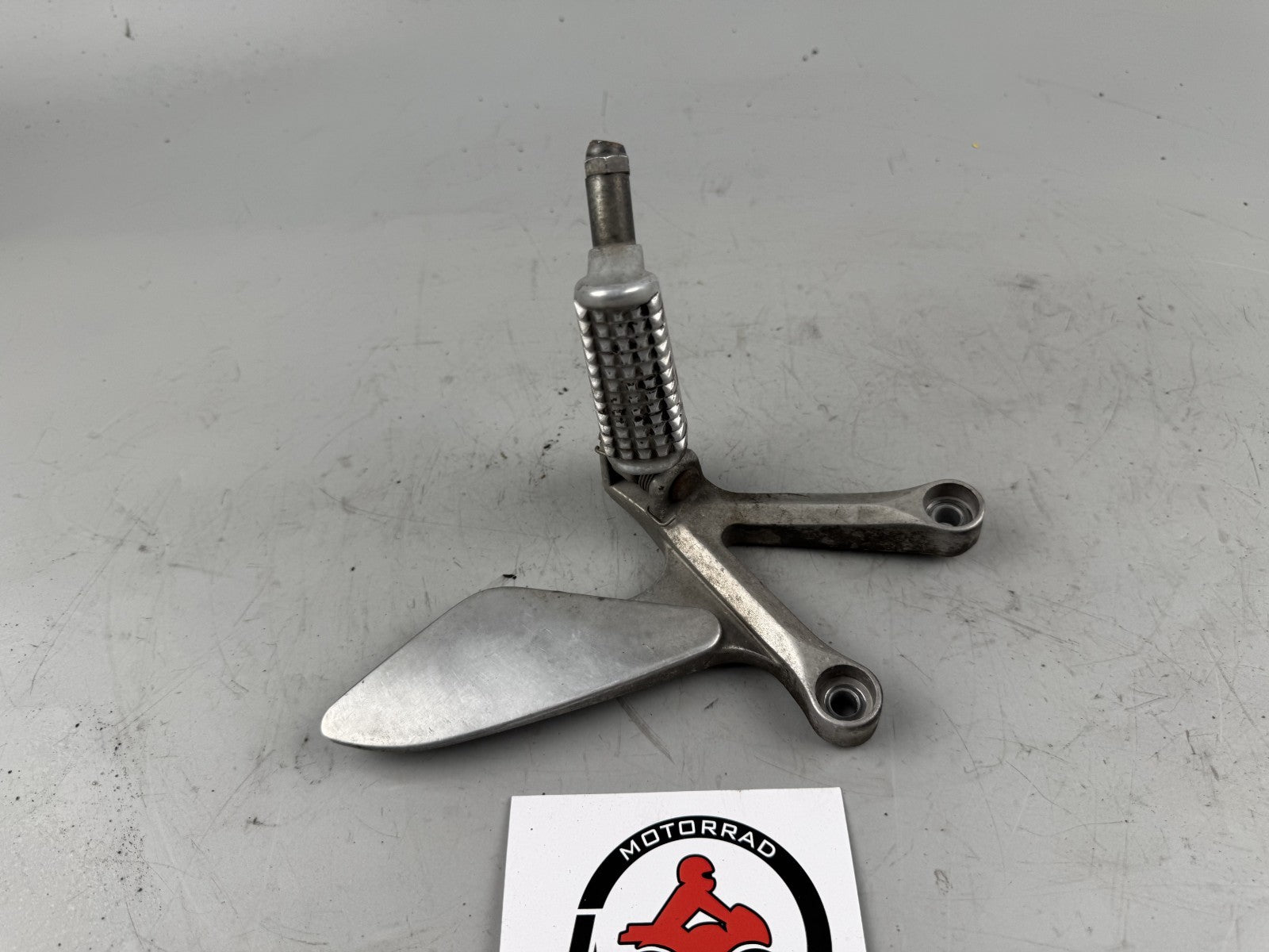 Honda VFR750 F RC36/1 Fußraste vorne links Foot Step Hangers front left