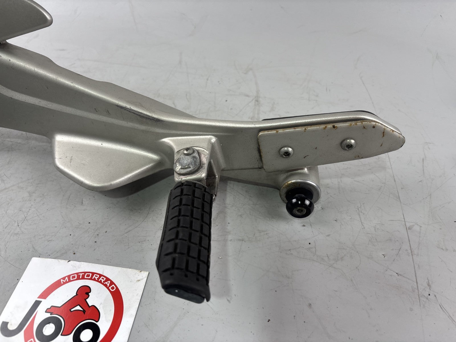 Honda CBF 600 S PC38 Fußrastenanlage Foot hangers links left Halteplatte