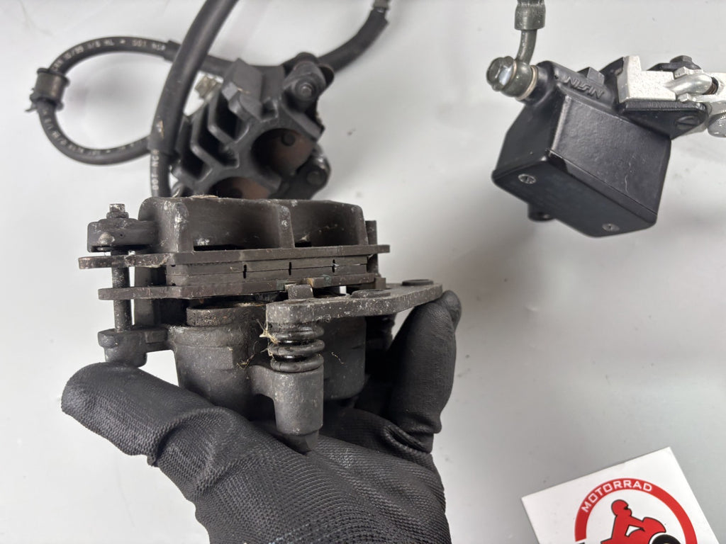 Suzuki SV650 N AV Bremse Brake Bremsanlage Bremssattel Zange vorne front