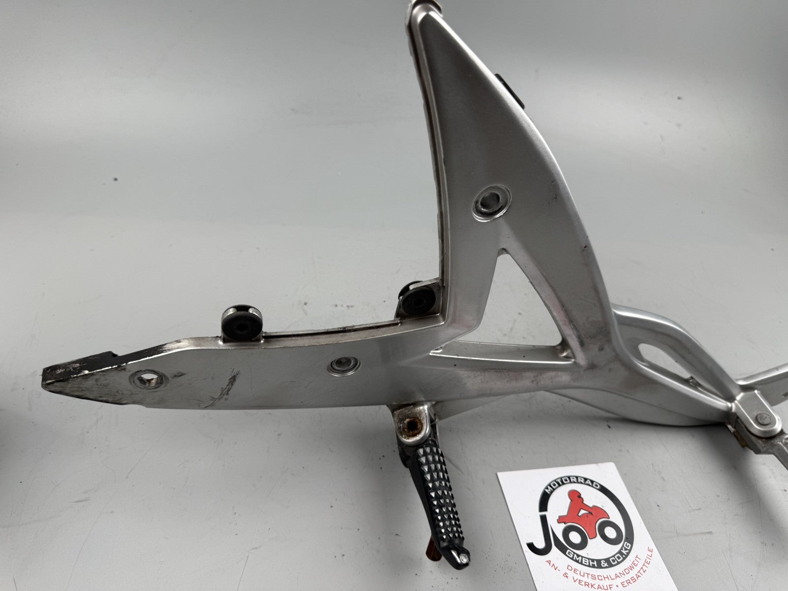 Kawasaki ER6F EX650A Fußrastenanlage Foot Steps Hangers links left Fußraste