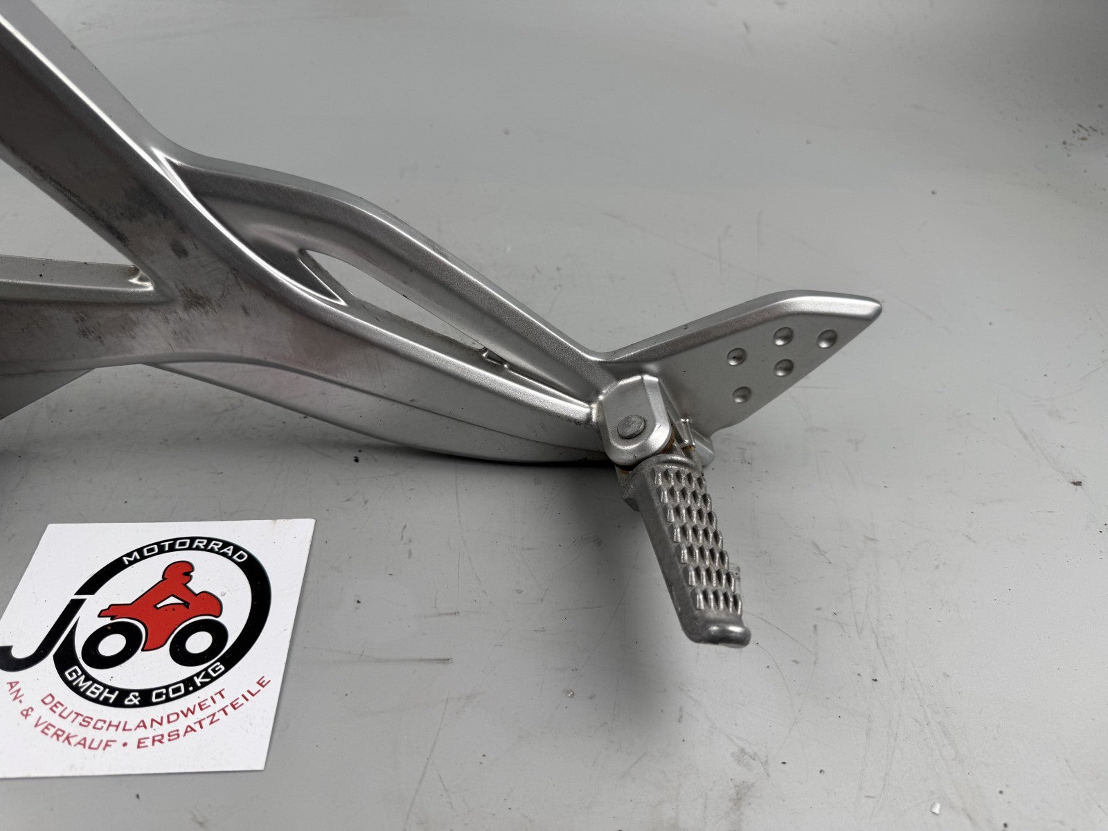 Kawasaki ER6F EX650A Fußrastenanlage Foot Steps Hangers links left Fußraste
